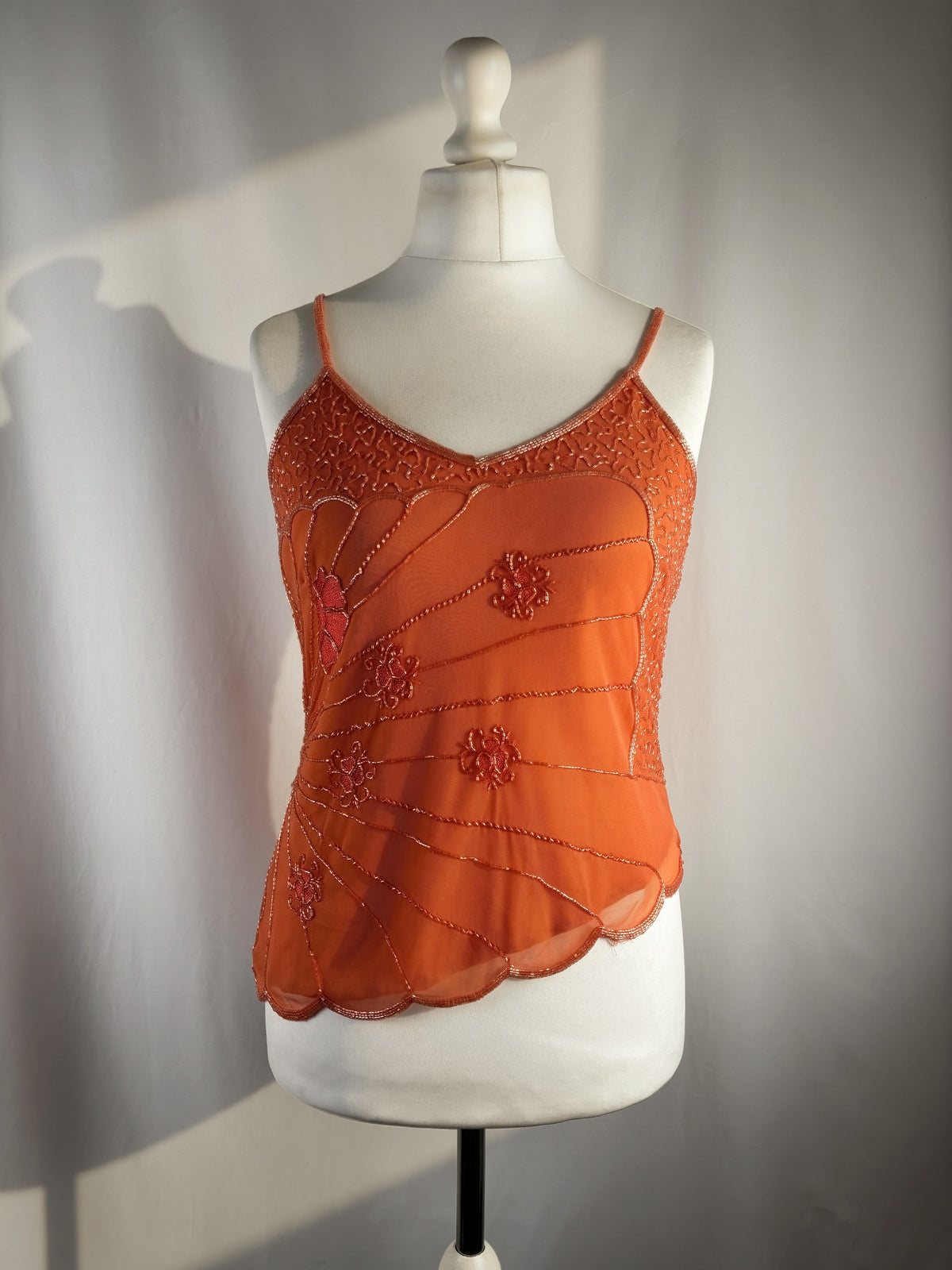 Orange asymmetric cut cami embellished with beads