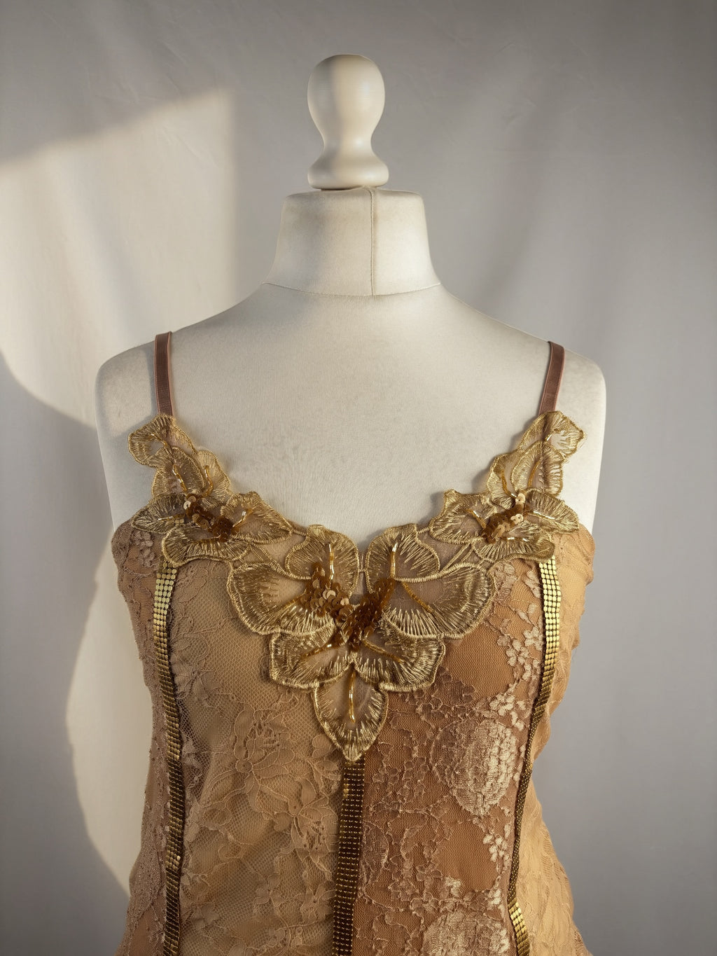 Golden asymmetric lace cami with embellished sequins