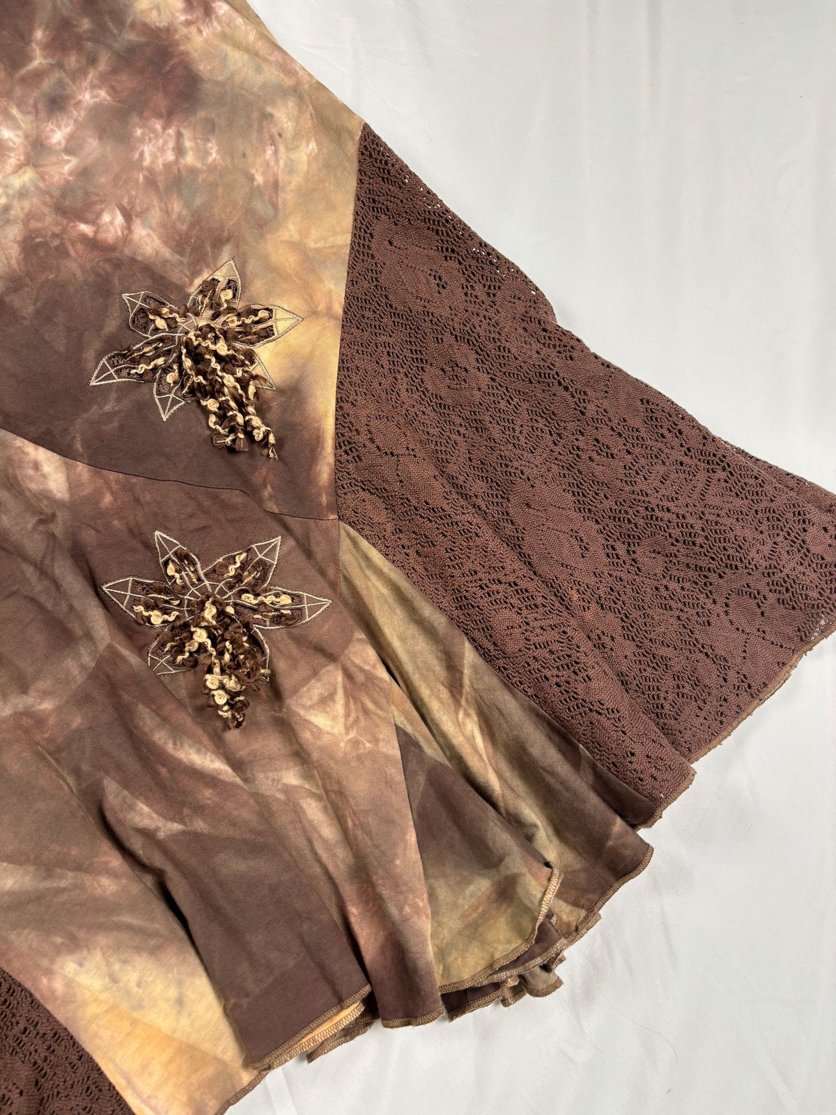 Brown and beige ombré patchwork skirt with floral tassel details