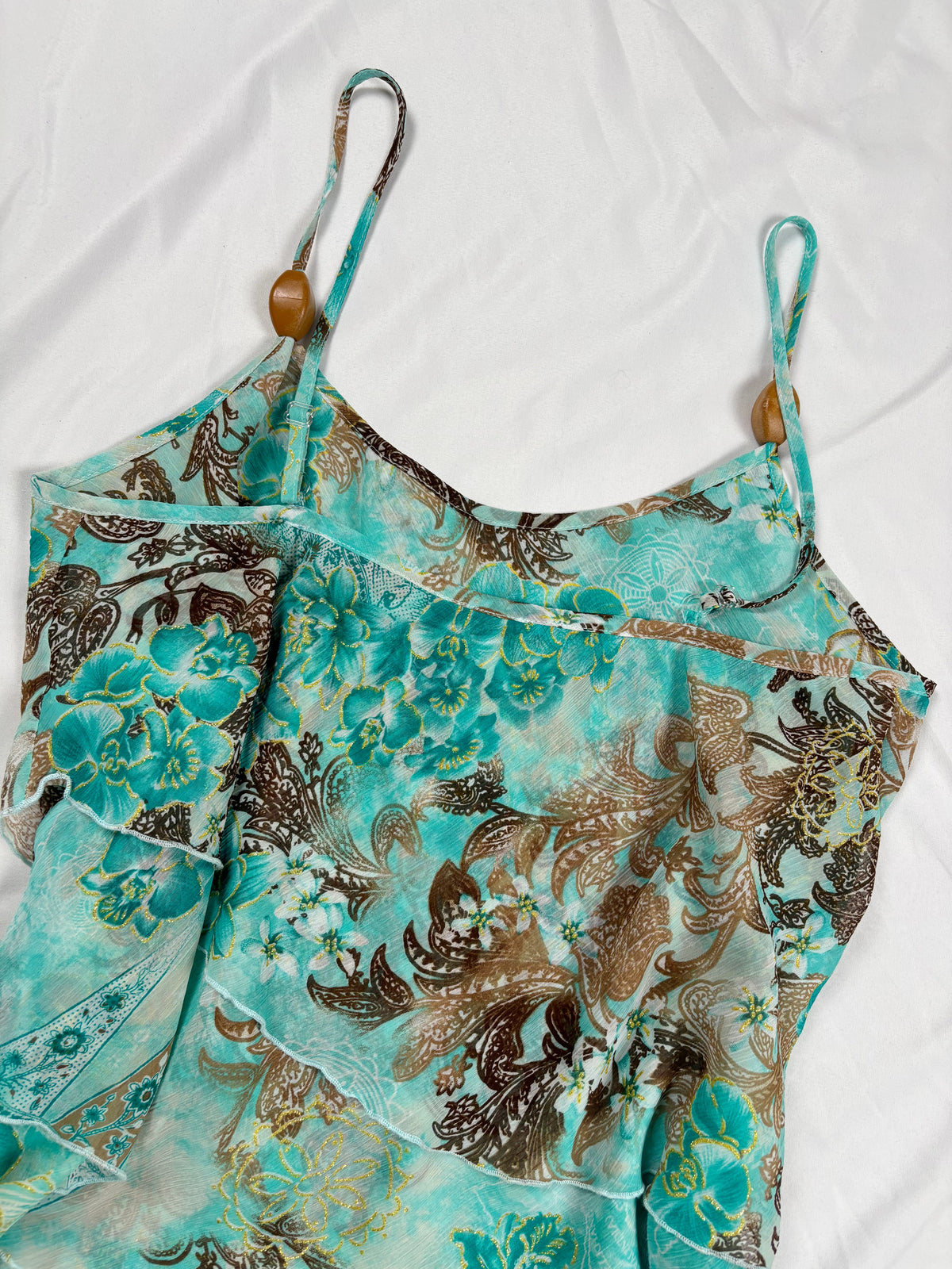 Blue and brown floral tiered ruffle cami with wooden bead details