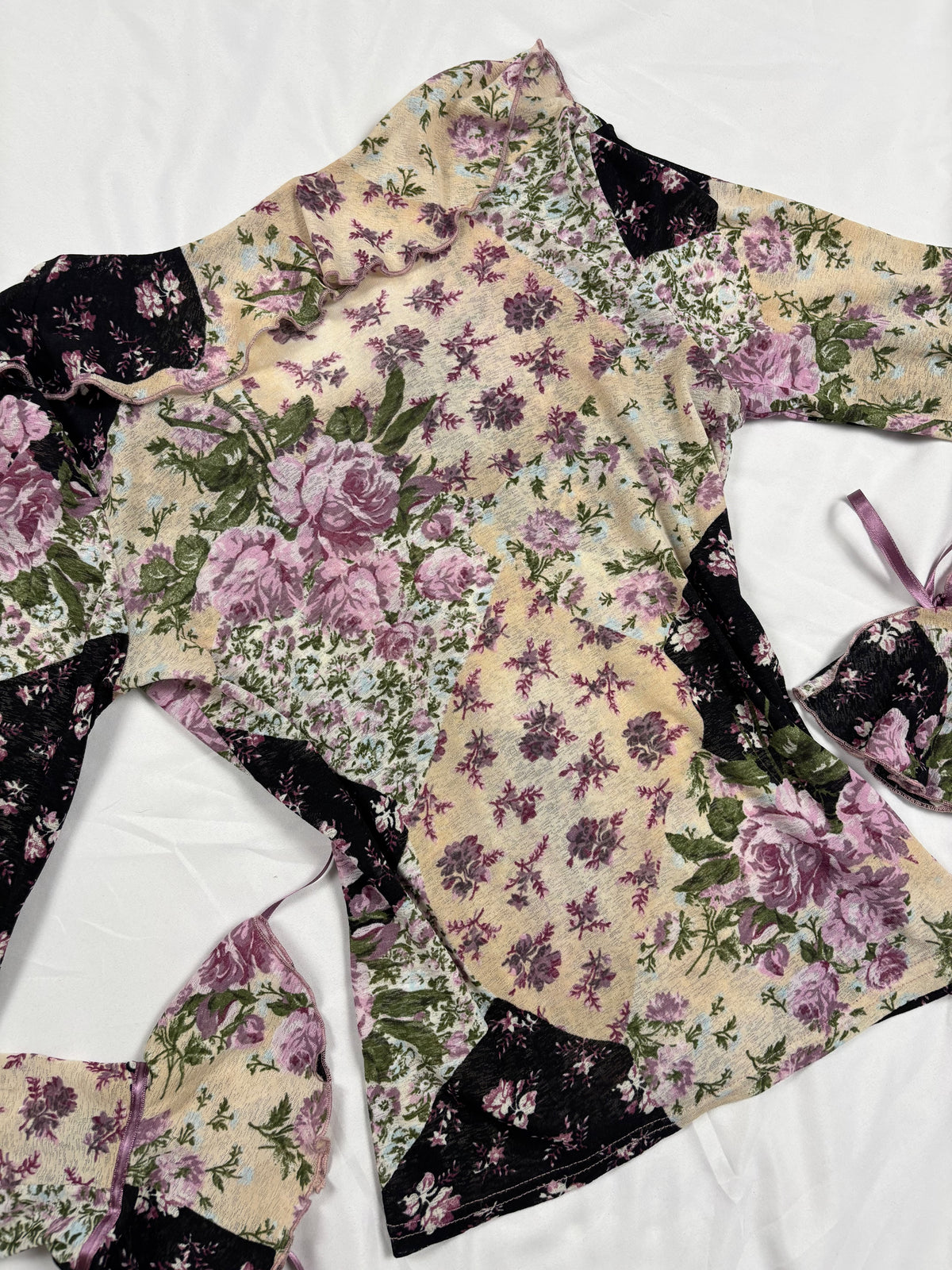 Floral patchwork long sleeve top with bow cuff detail
