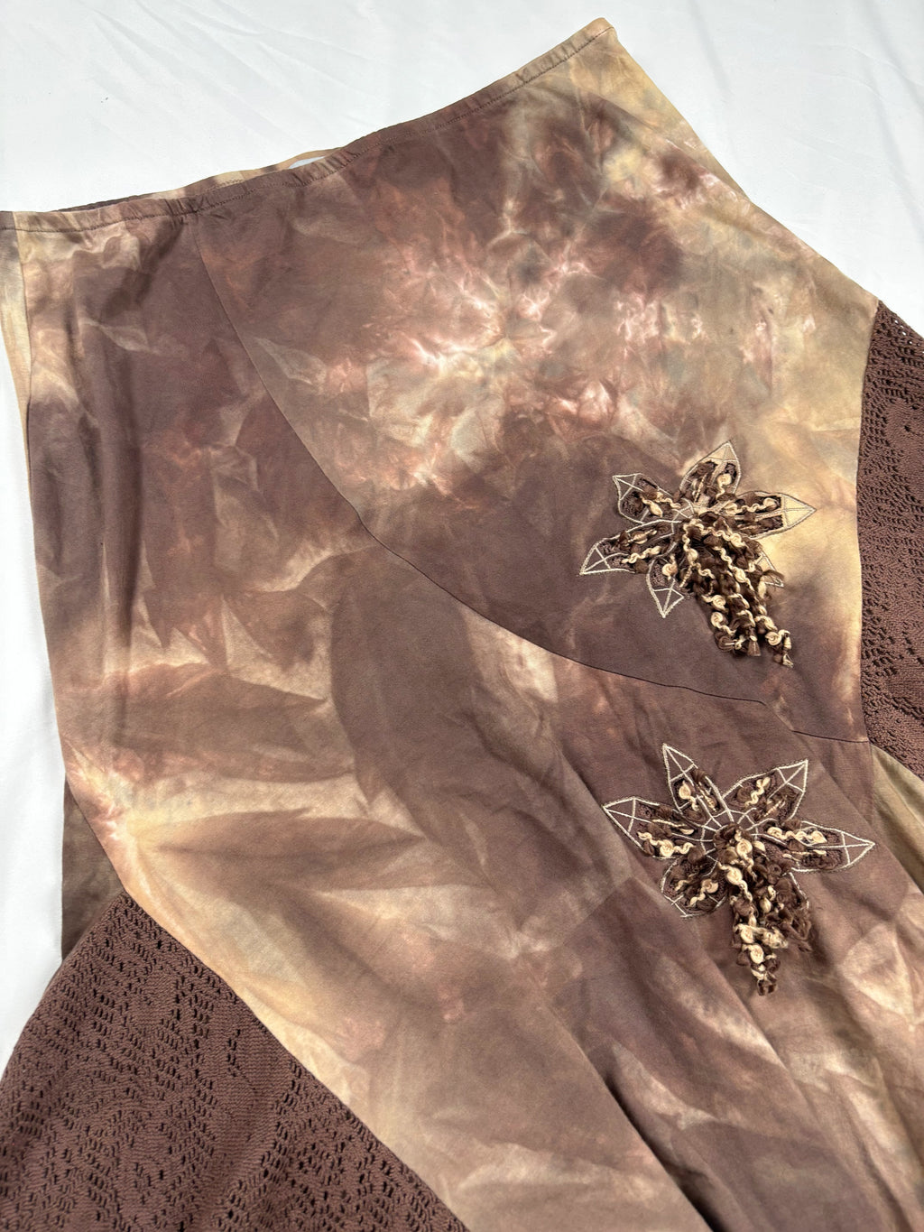 Brown and beige ombré patchwork skirt with floral tassel details