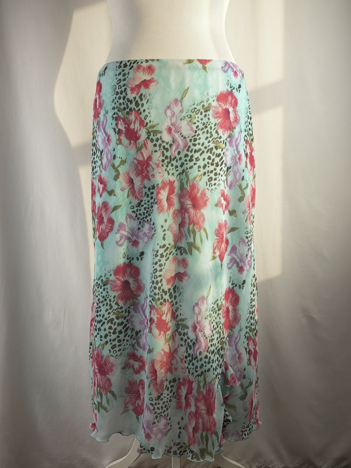 Light blue floral/ animal print skirt with ruffle detail