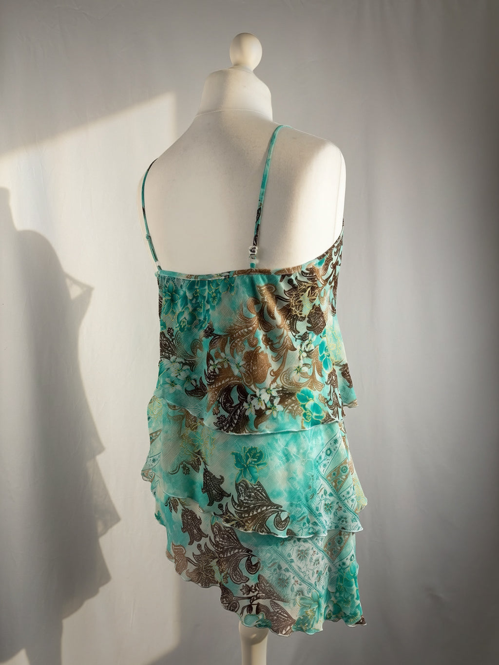 Blue and brown floral tiered ruffle cami with wooden bead details