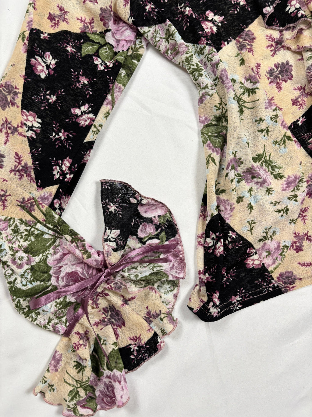 Floral patchwork long sleeve top with bow cuff detail
