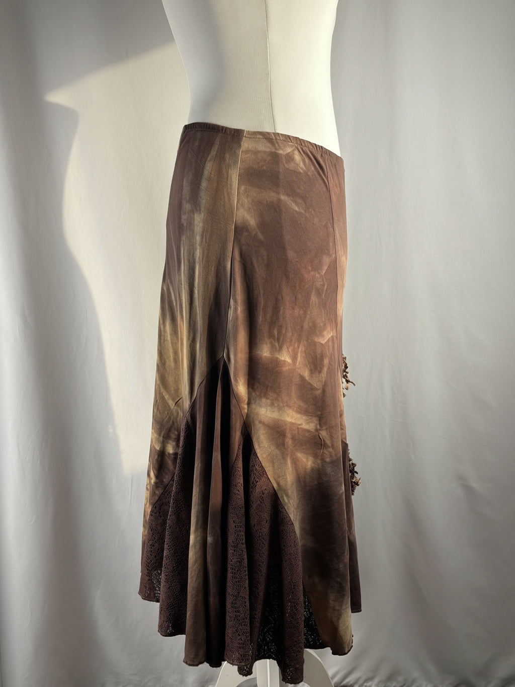 Brown and beige ombré patchwork skirt with floral tassel details