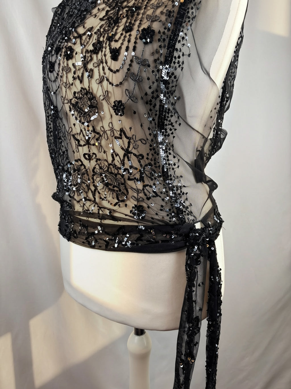 Black sheer silk side tie top embellished with sequins