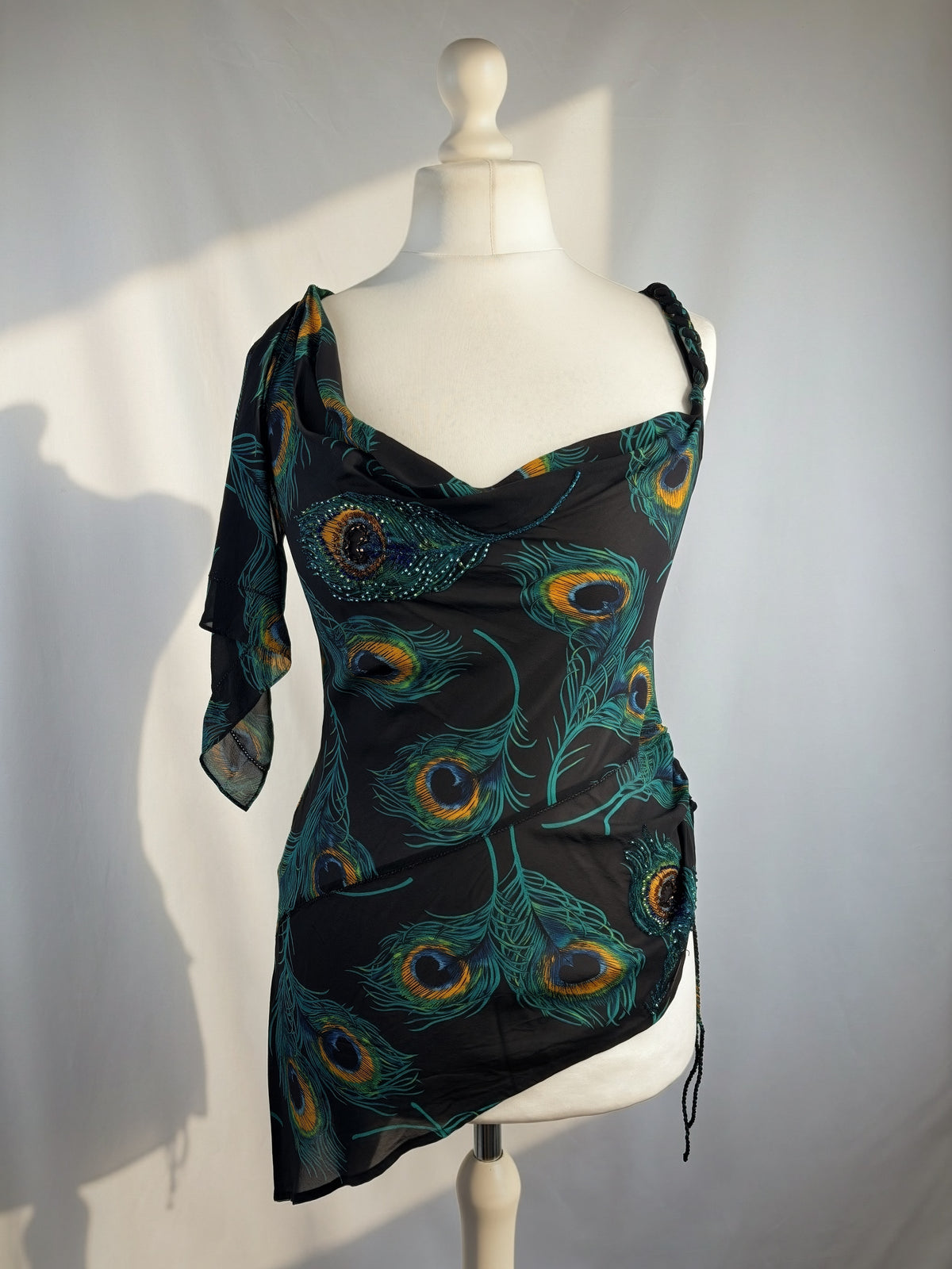 Black sheer silk peacock detailed cross back top with embellishments