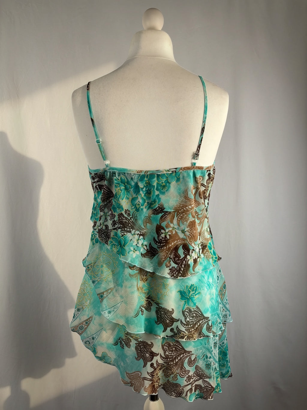 Blue and brown floral tiered ruffle cami with wooden bead details