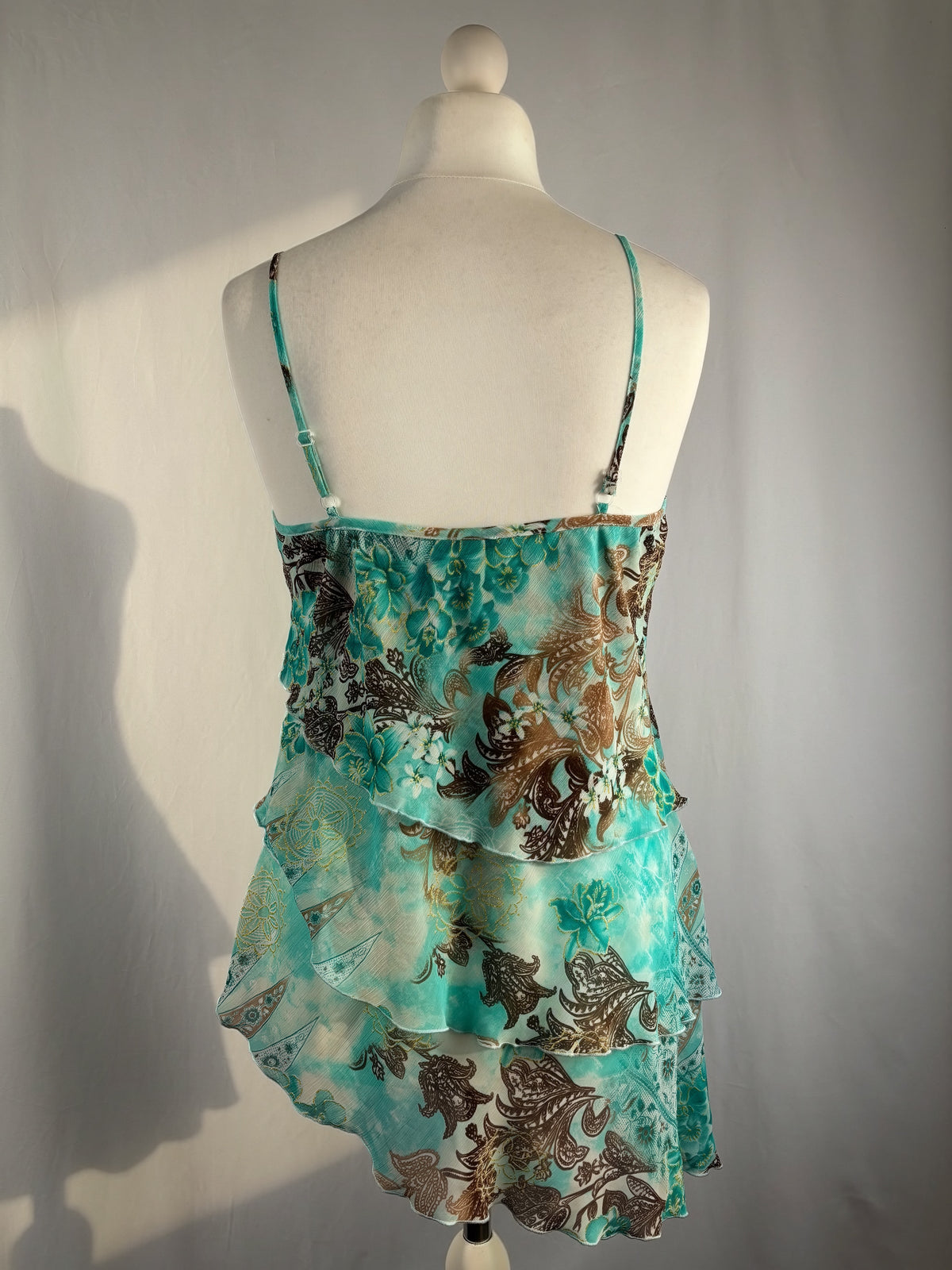 Blue and brown floral tiered ruffle cami with wooden bead details
