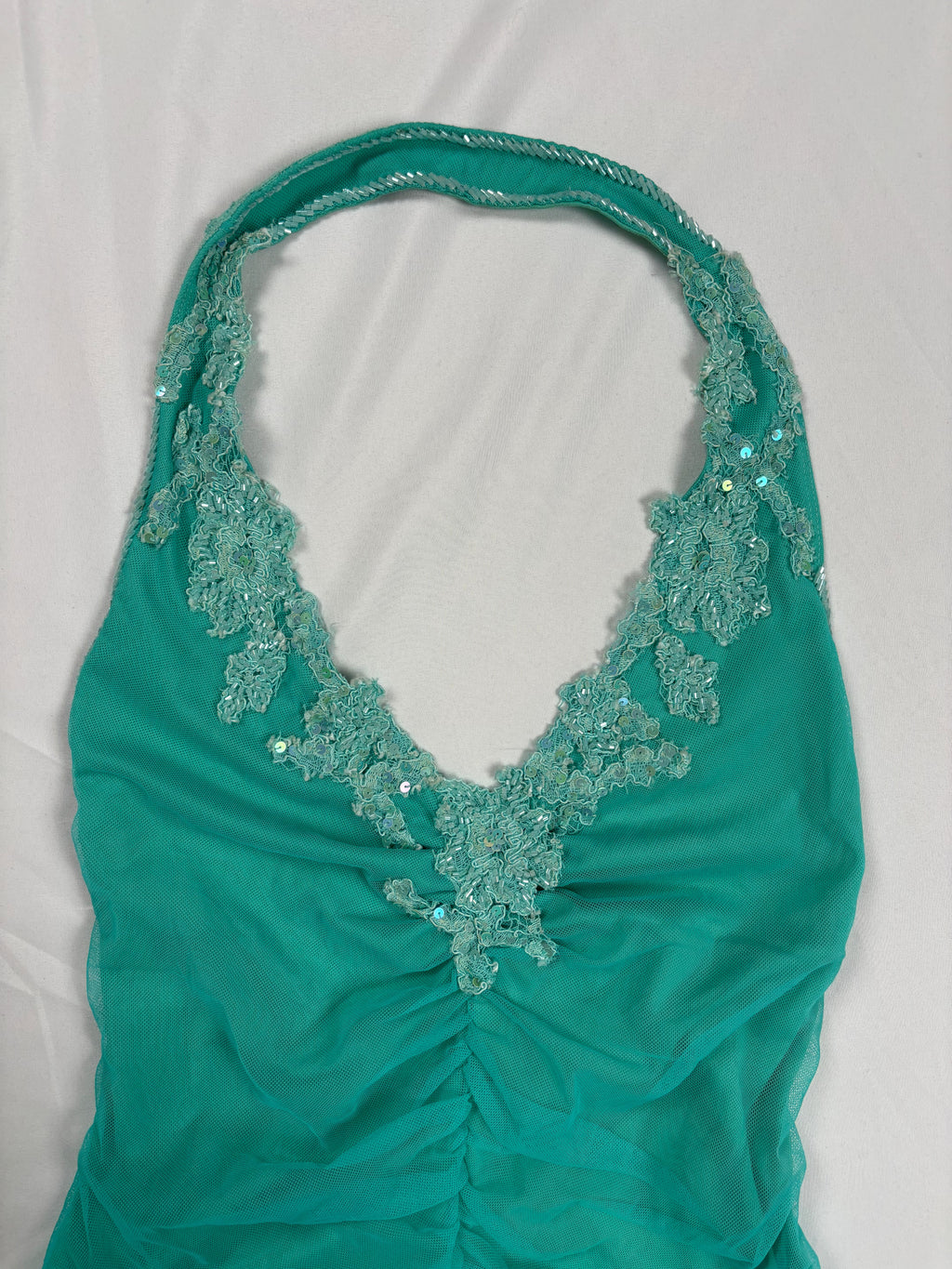 Bright blue ruched aftershock halter neck with beaded lace details