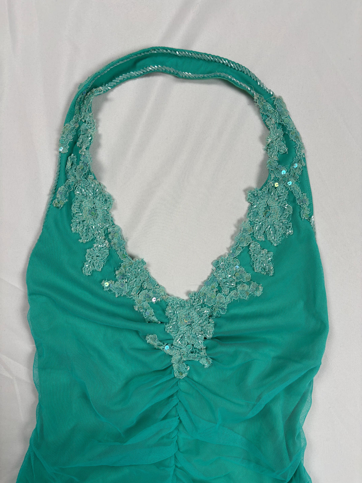 Bright blue ruched aftershock halter neck with beaded lace details