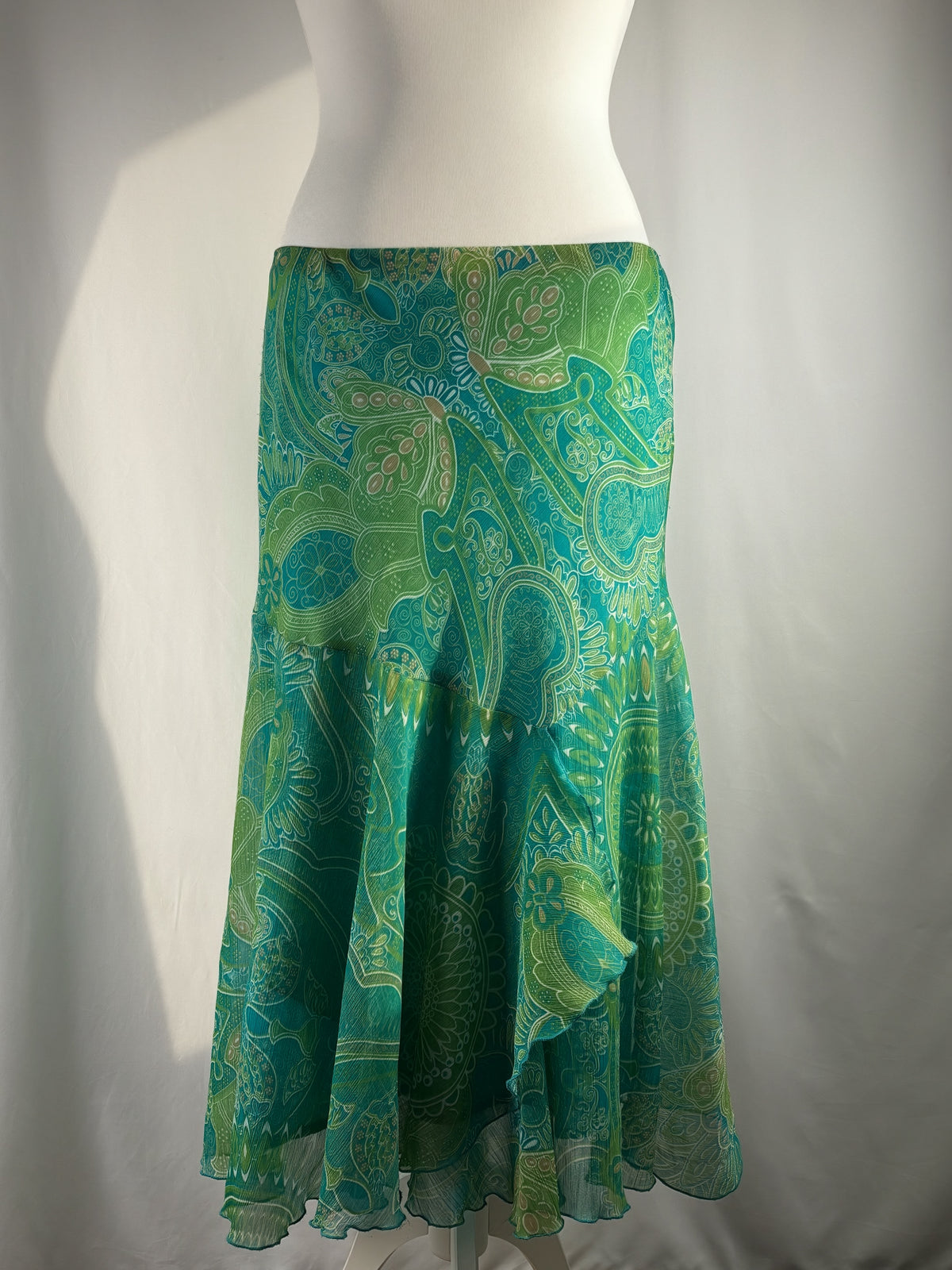Green and blue tropical ruffle detailed midi skirt