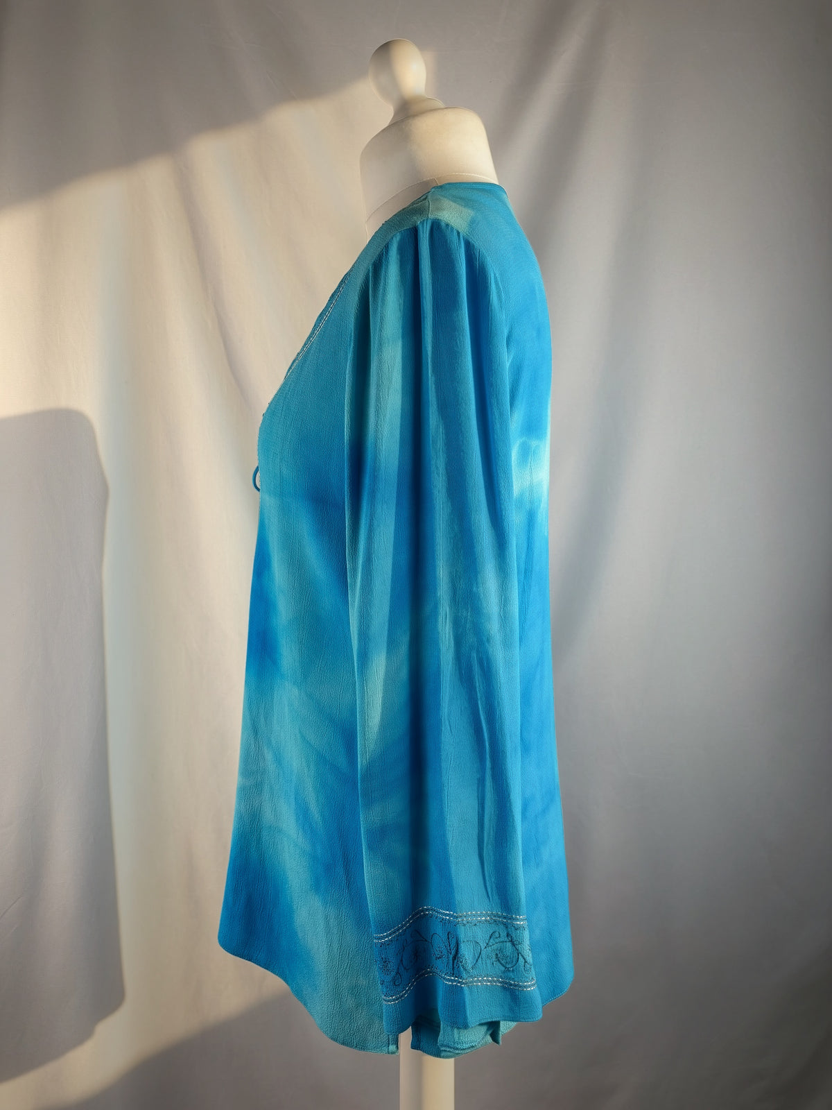 Blue ombré long sleeve top with embroidery details