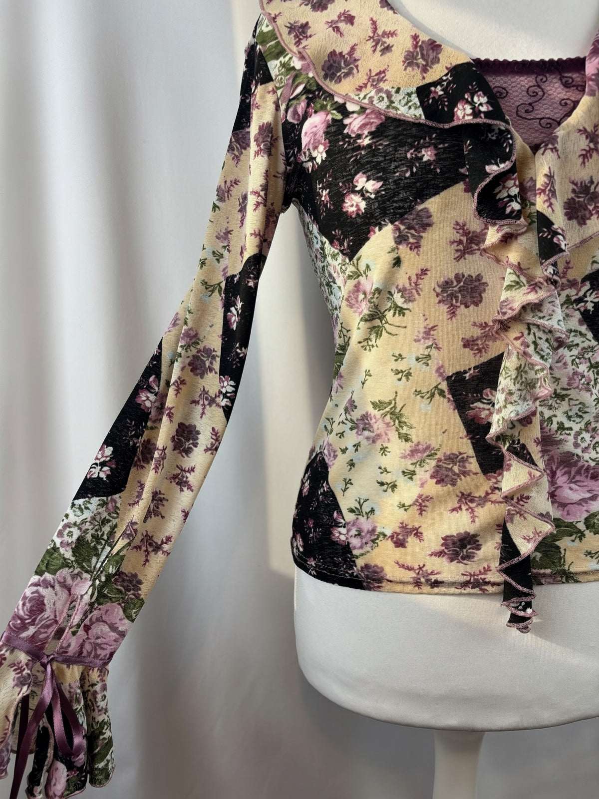 Floral patchwork long sleeve top with bow cuff detail