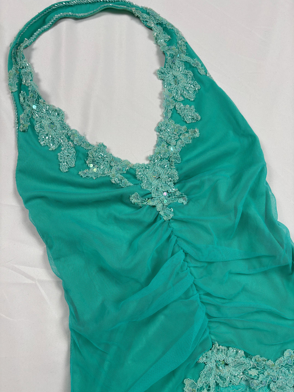 Bright blue ruched aftershock halter neck with beaded lace details