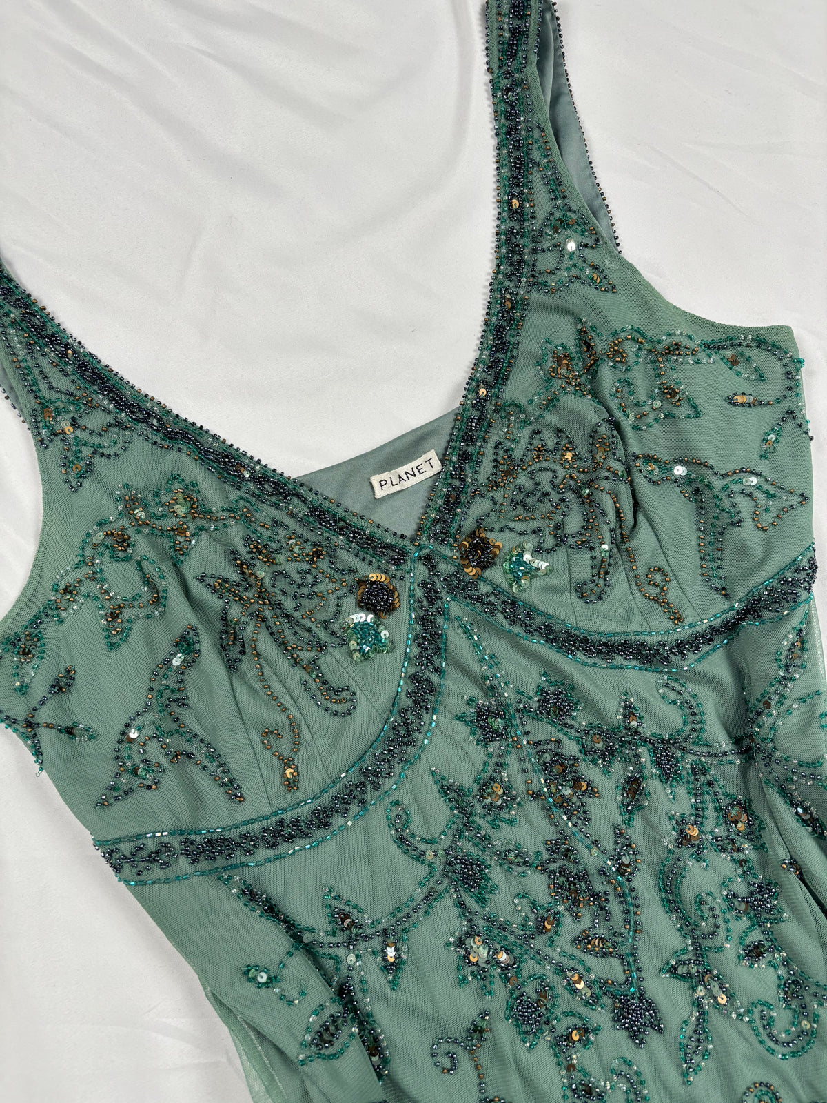 Green heavily beaded v neck fairy top