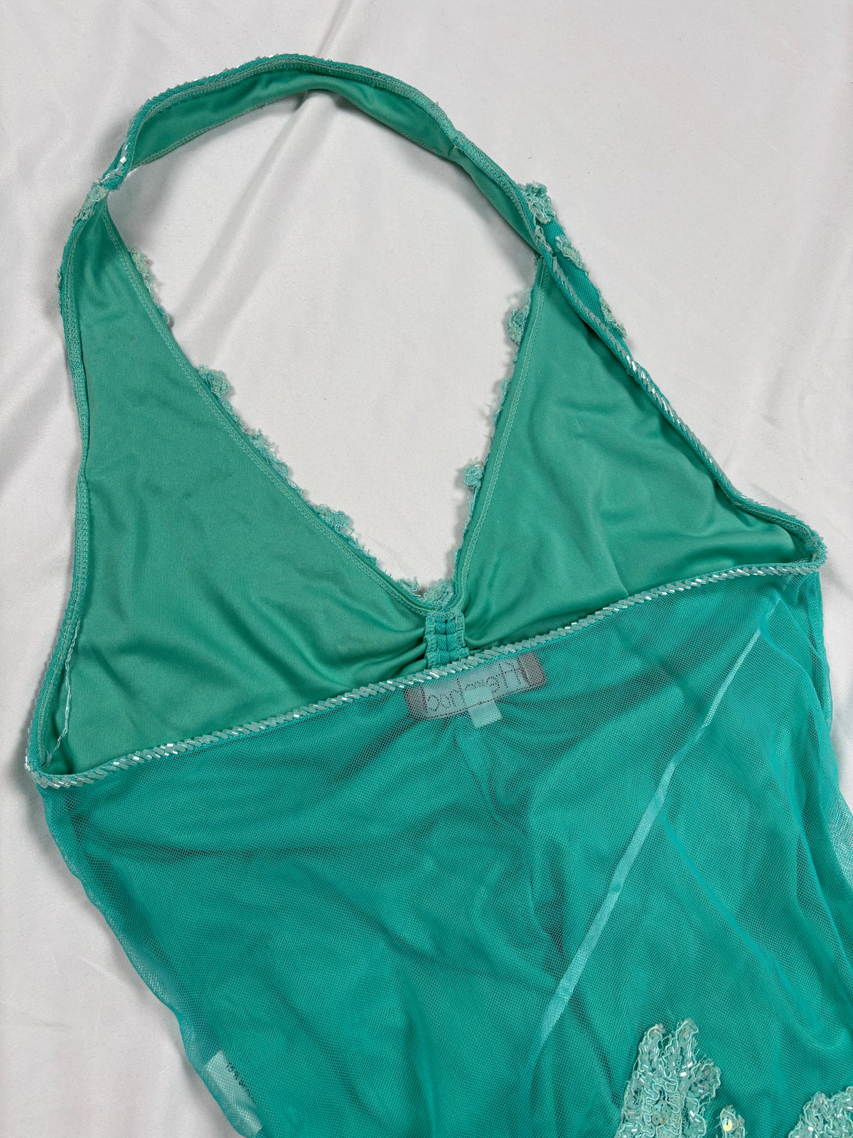 Bright blue ruched aftershock halter neck with beaded lace details