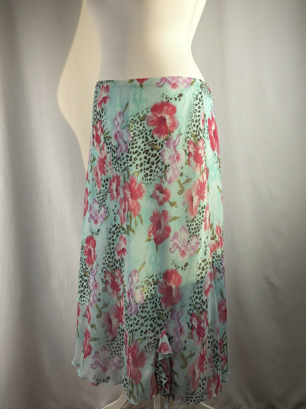 Light blue floral/ animal print skirt with ruffle detail