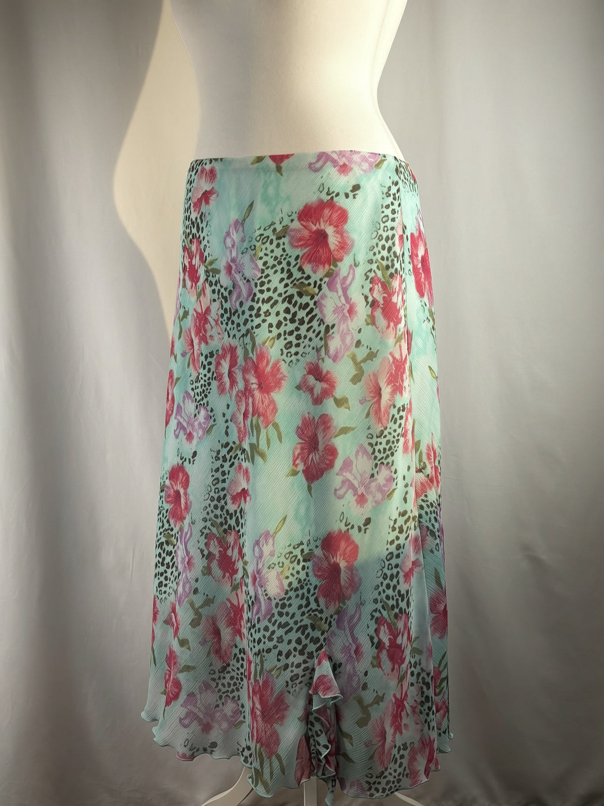 Light blue floral/ animal print skirt with ruffle detail