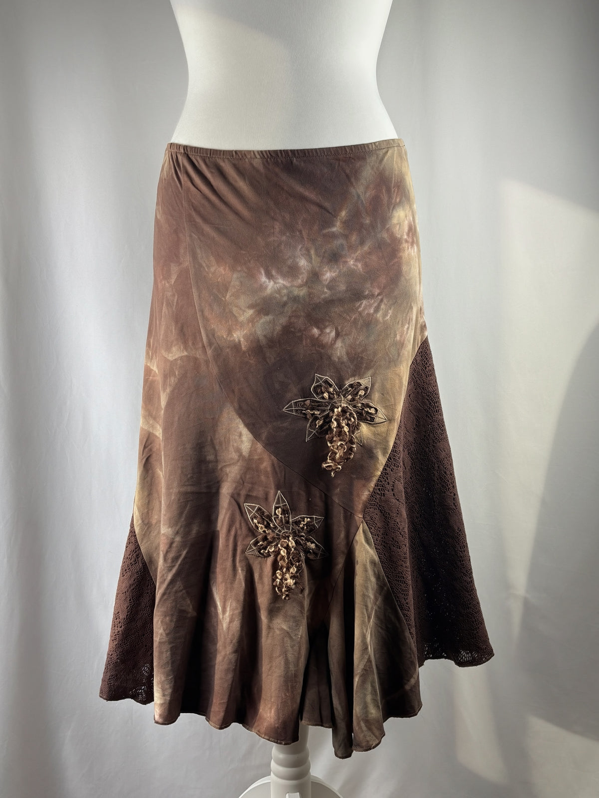 Brown and beige ombré patchwork skirt with floral tassel details