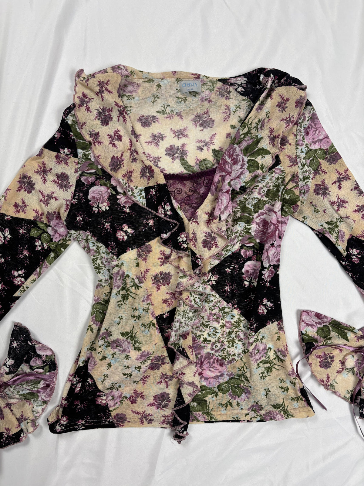 Floral patchwork long sleeve top with bow cuff detail