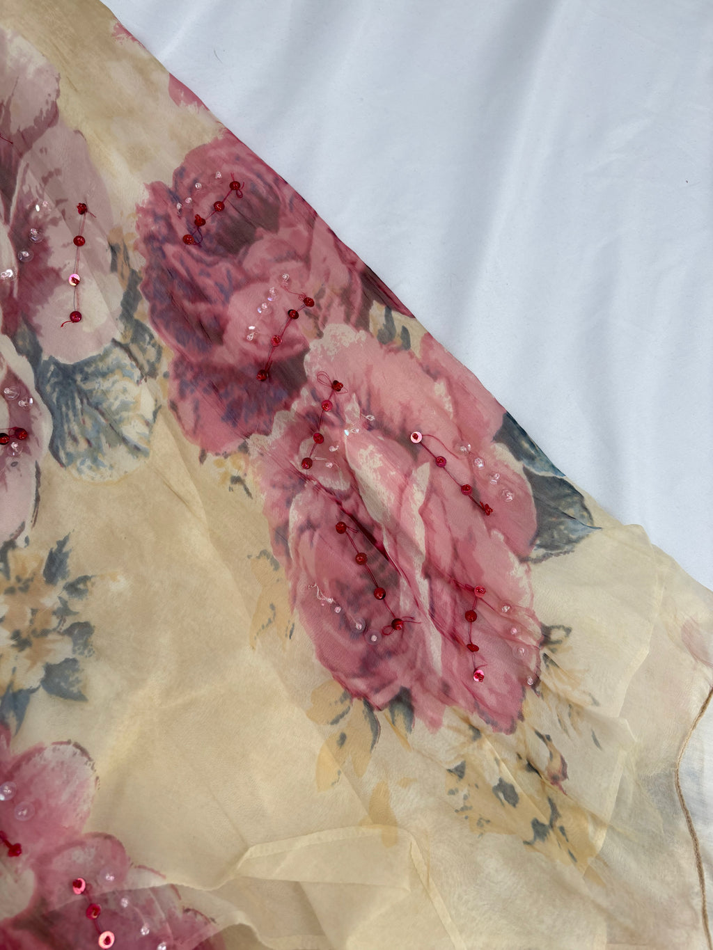 Sheer cream floral midi skirt embellished with sequins