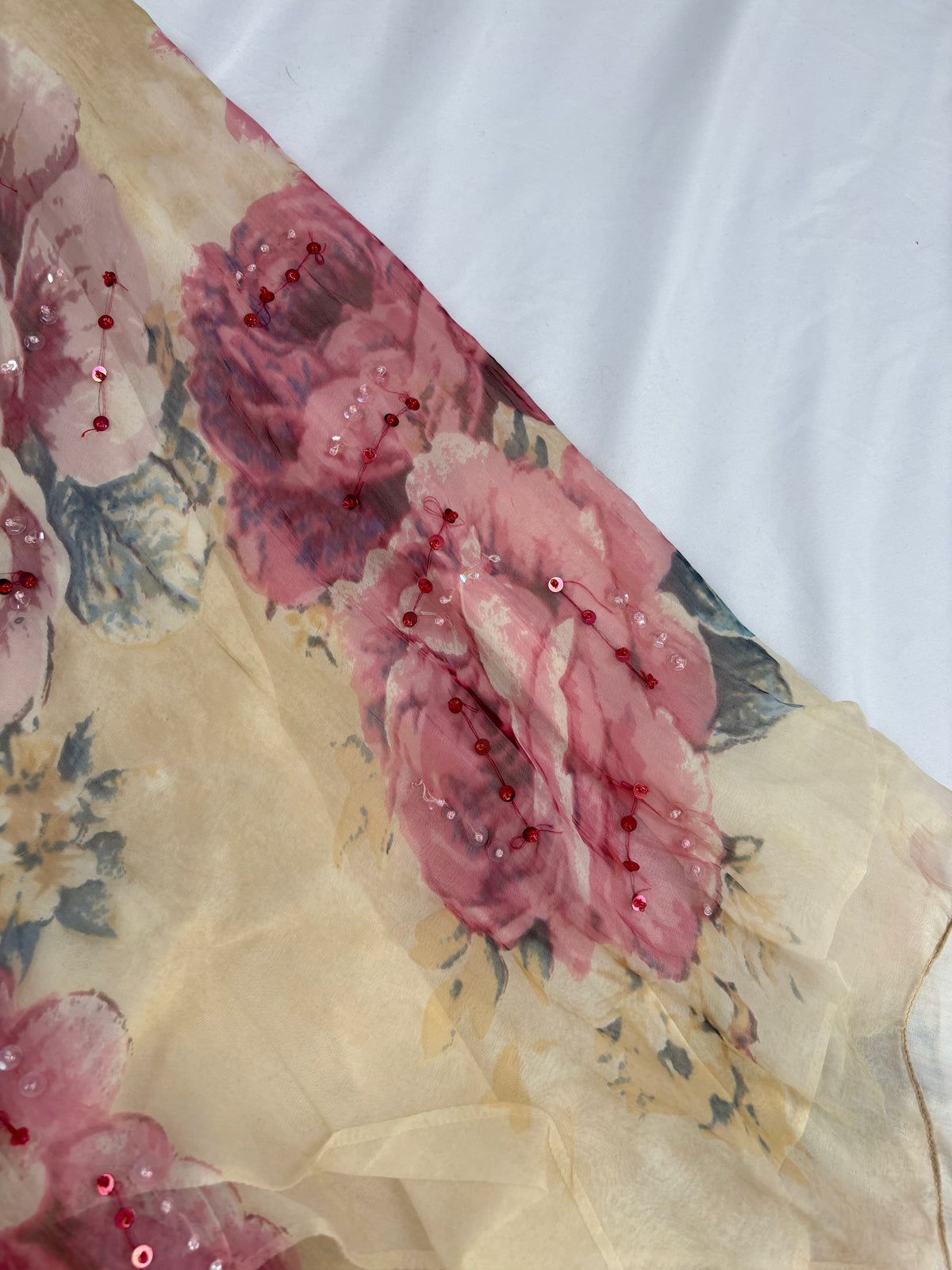 Sheer cream floral midi skirt embellished with sequins