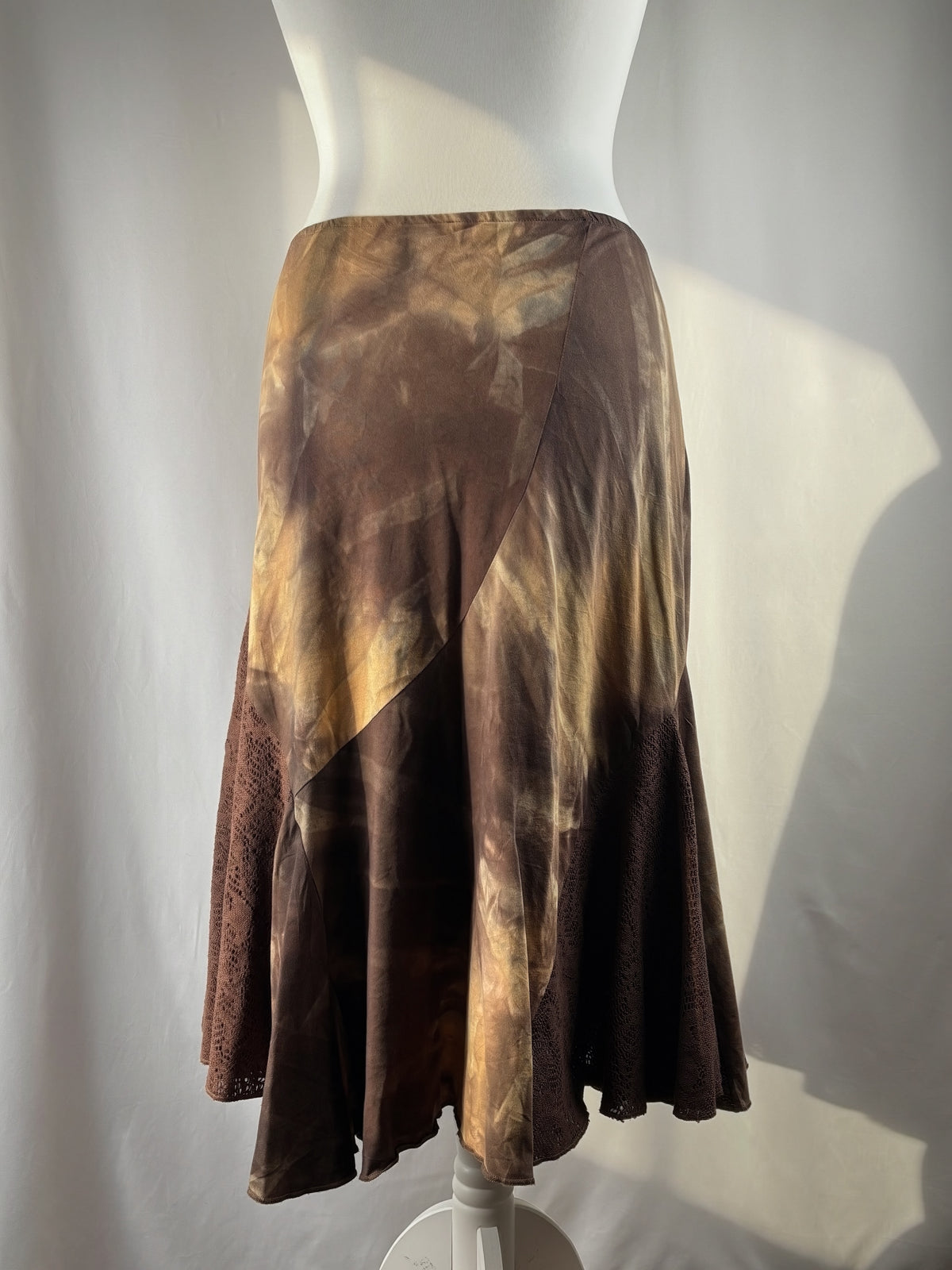 Brown and beige ombré patchwork skirt with floral tassel details