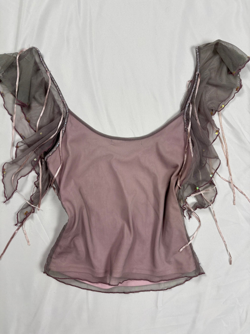 Muted purple ruffle sleeve top with embroidered sequin details