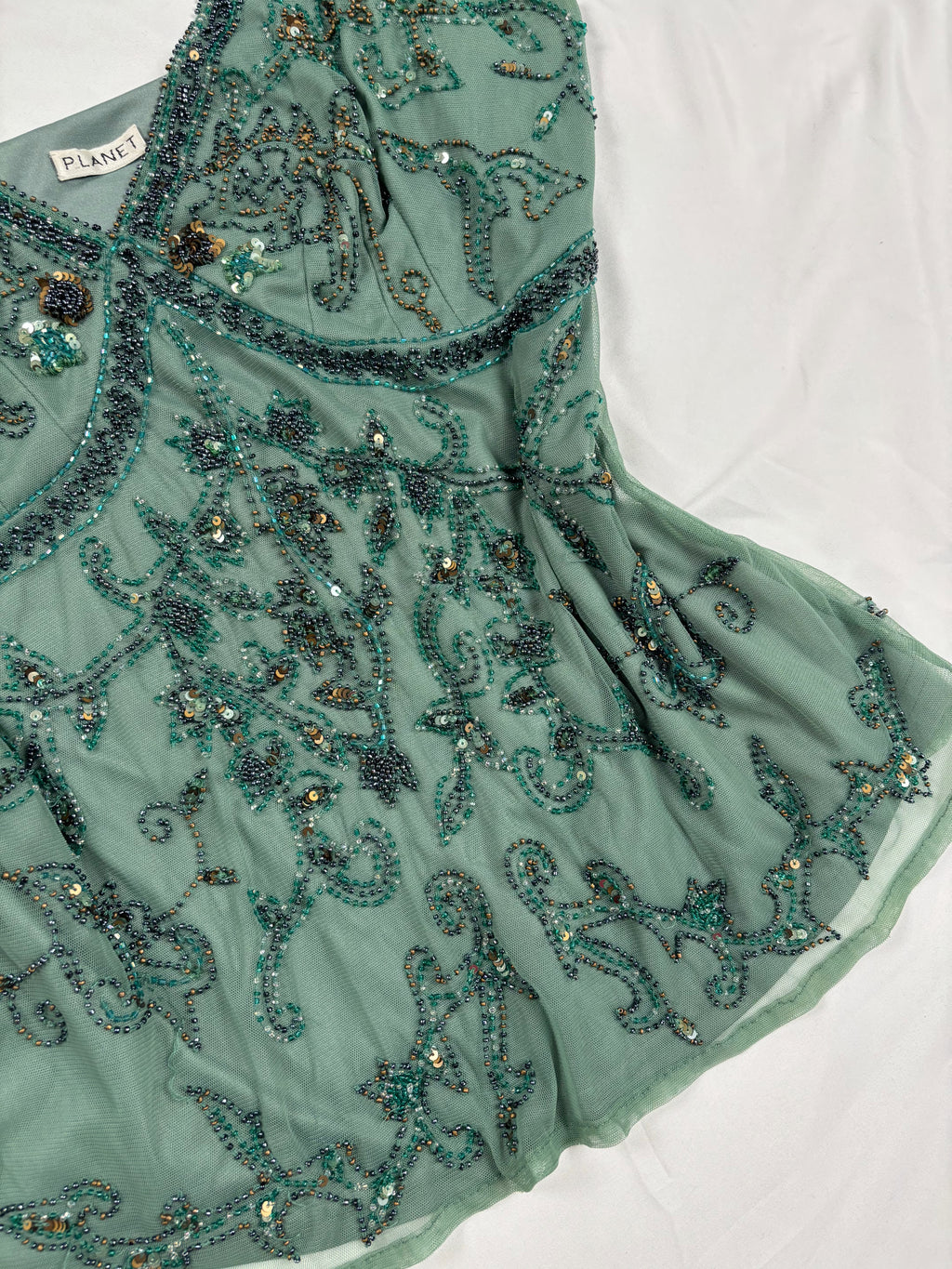 Green heavily beaded v neck fairy top
