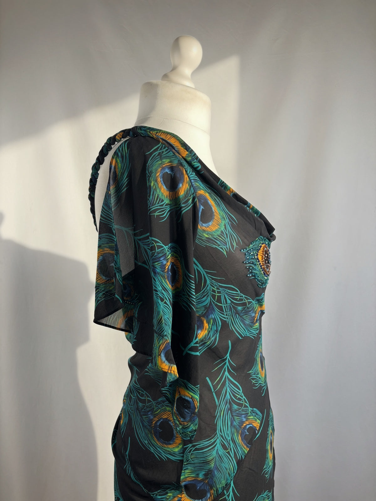 Black sheer silk peacock detailed cross back top with embellishments