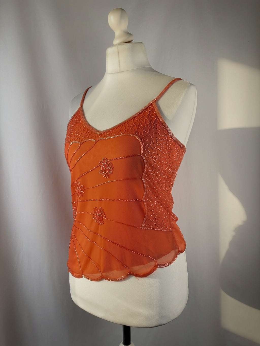 Orange asymmetric cut cami embellished with beads
