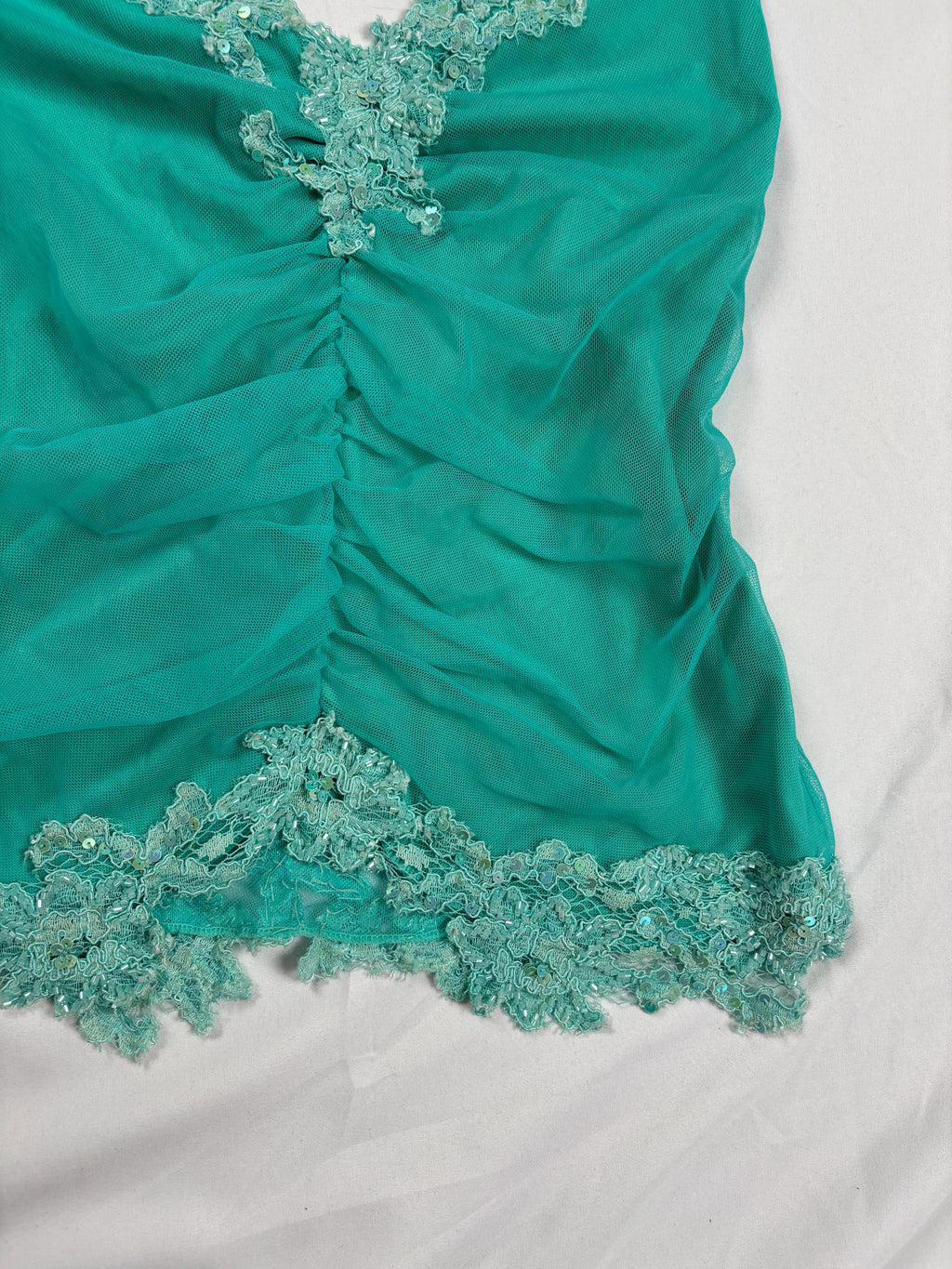 Bright blue ruched aftershock halter neck with beaded lace details