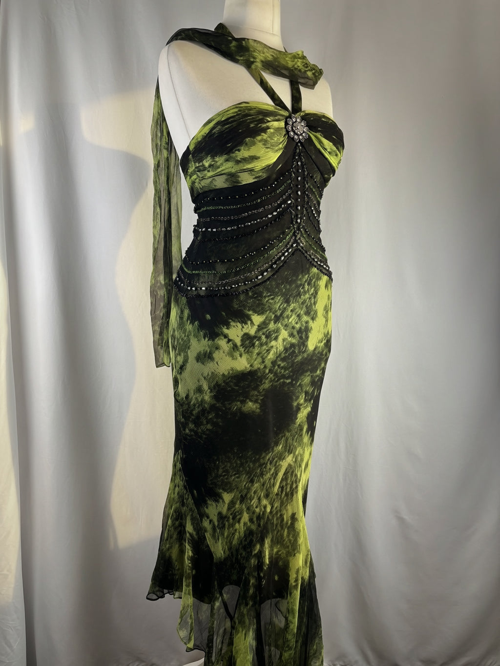 Black and green silk asymmetric beaded halterneck dress with shawl
