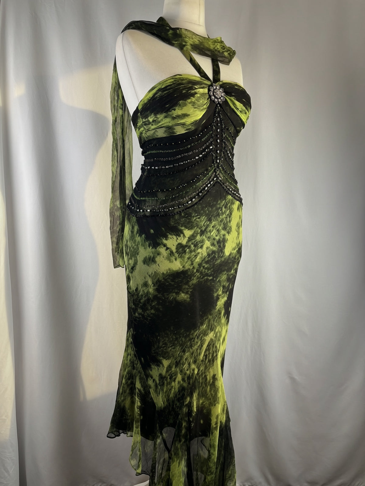Black and green silk asymmetric beaded halterneck dress with shawl