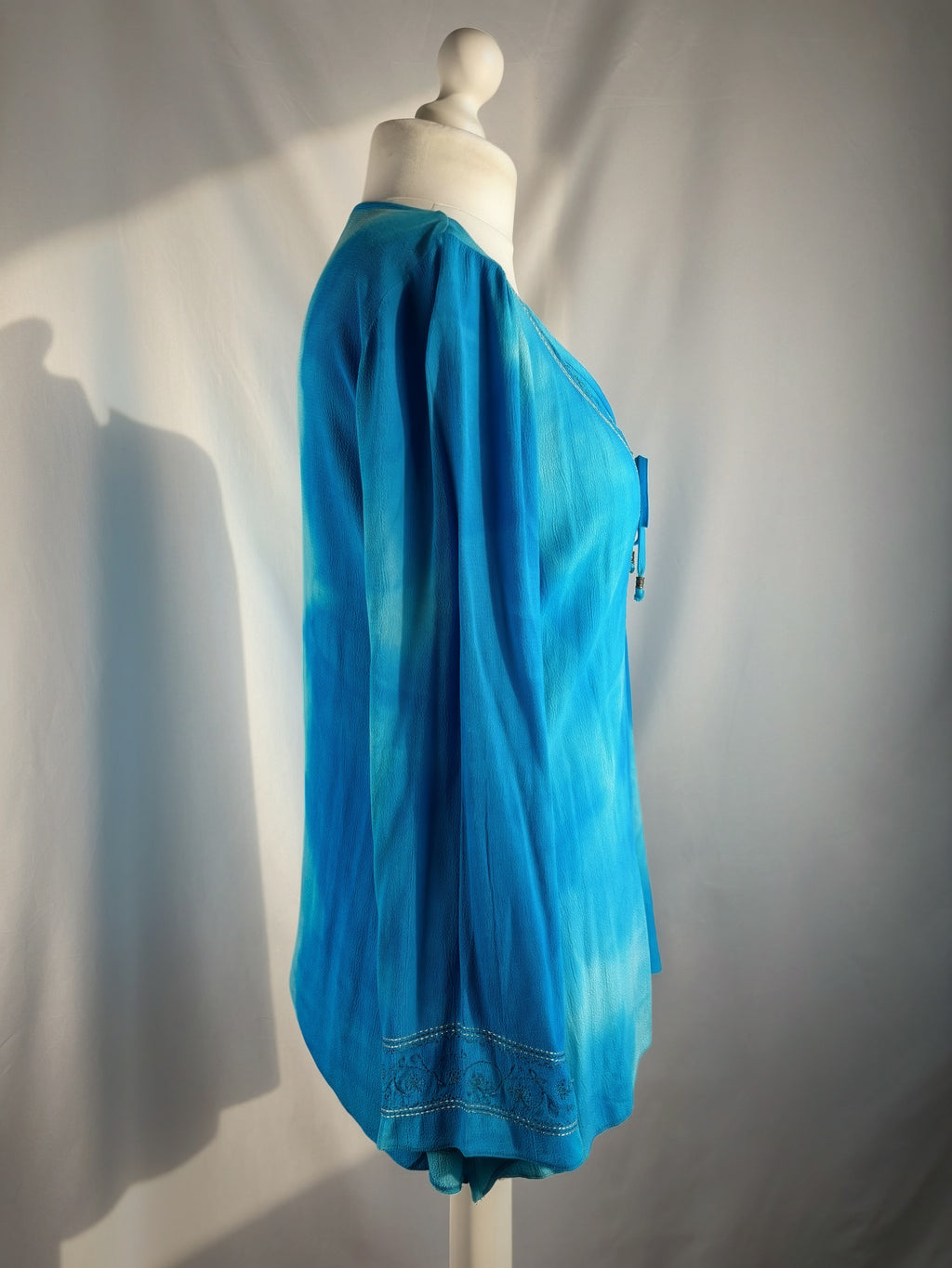 Blue ombré long sleeve top with embroidery details