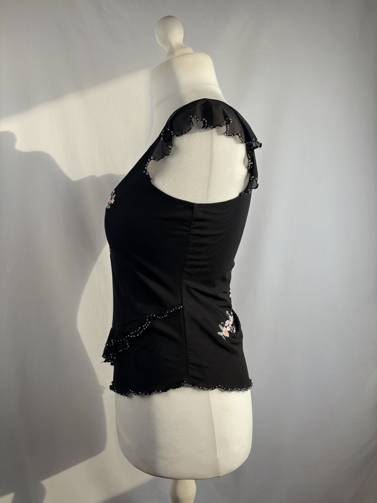 Black milkmaid neckline top with embellished cherry blossom details