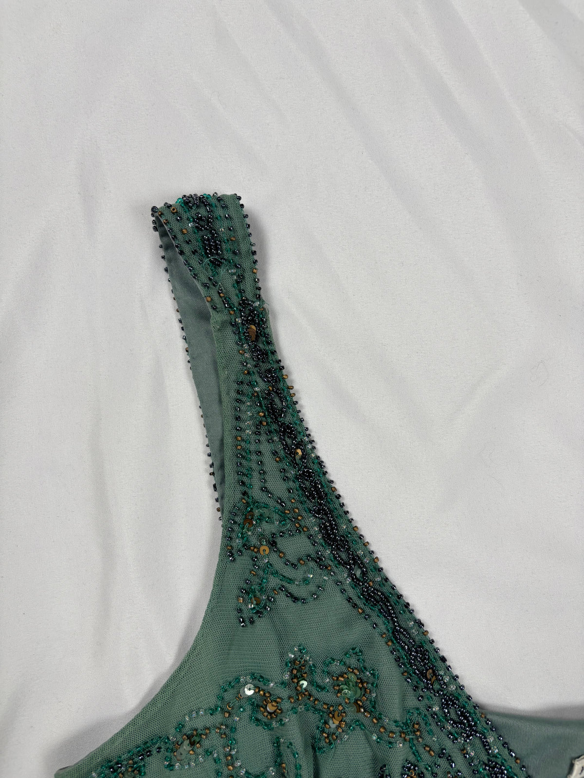 Green heavily beaded v neck fairy top