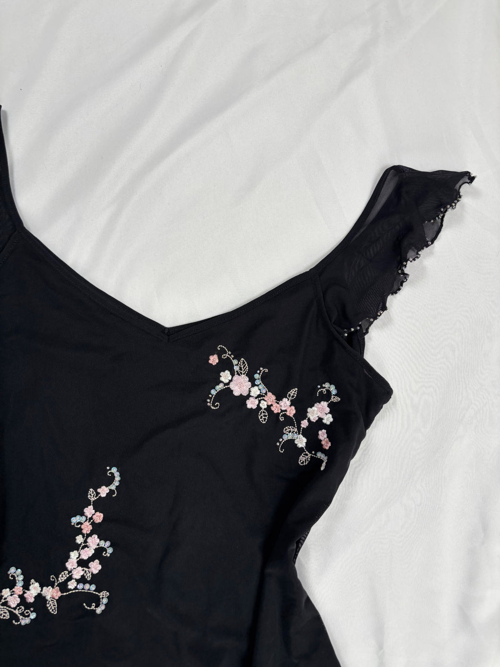 Black milkmaid neckline top with embellished cherry blossom details