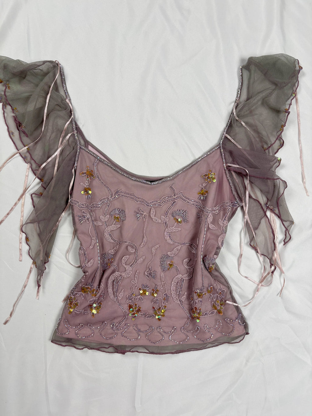 Muted purple ruffle sleeve top with embroidered sequin details