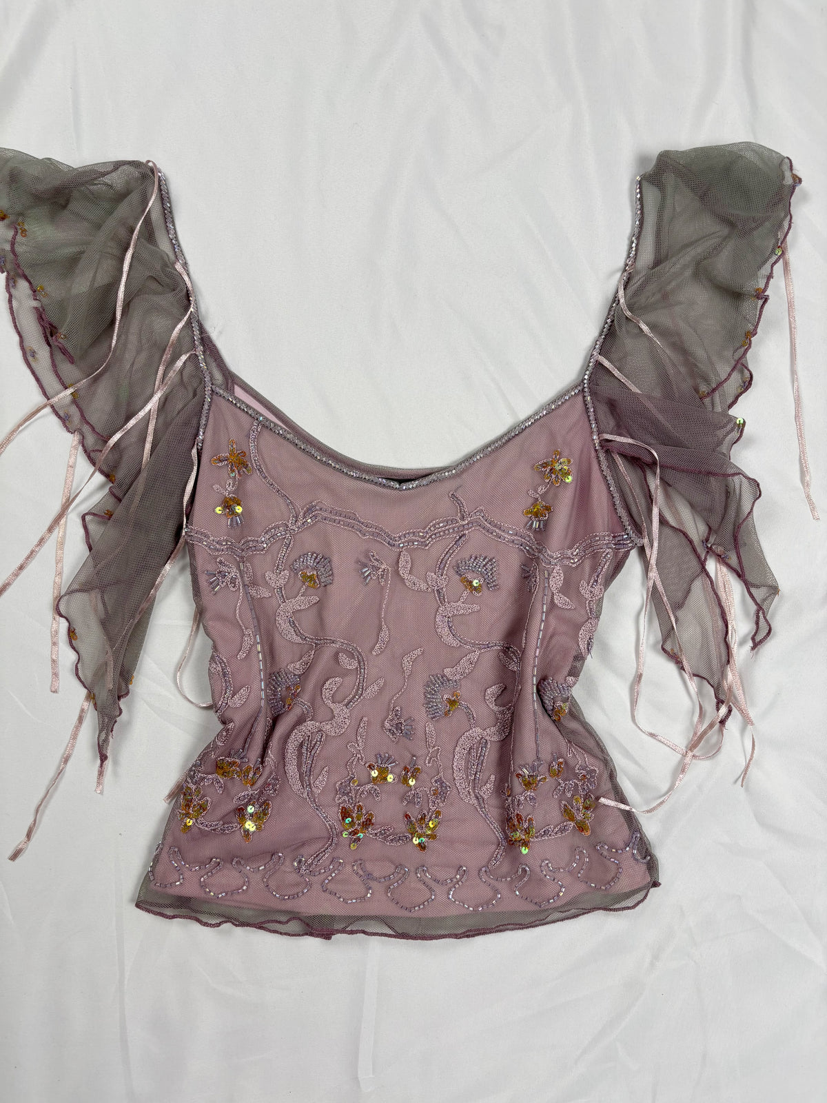 Muted purple ruffle sleeve top with embroidered sequin details