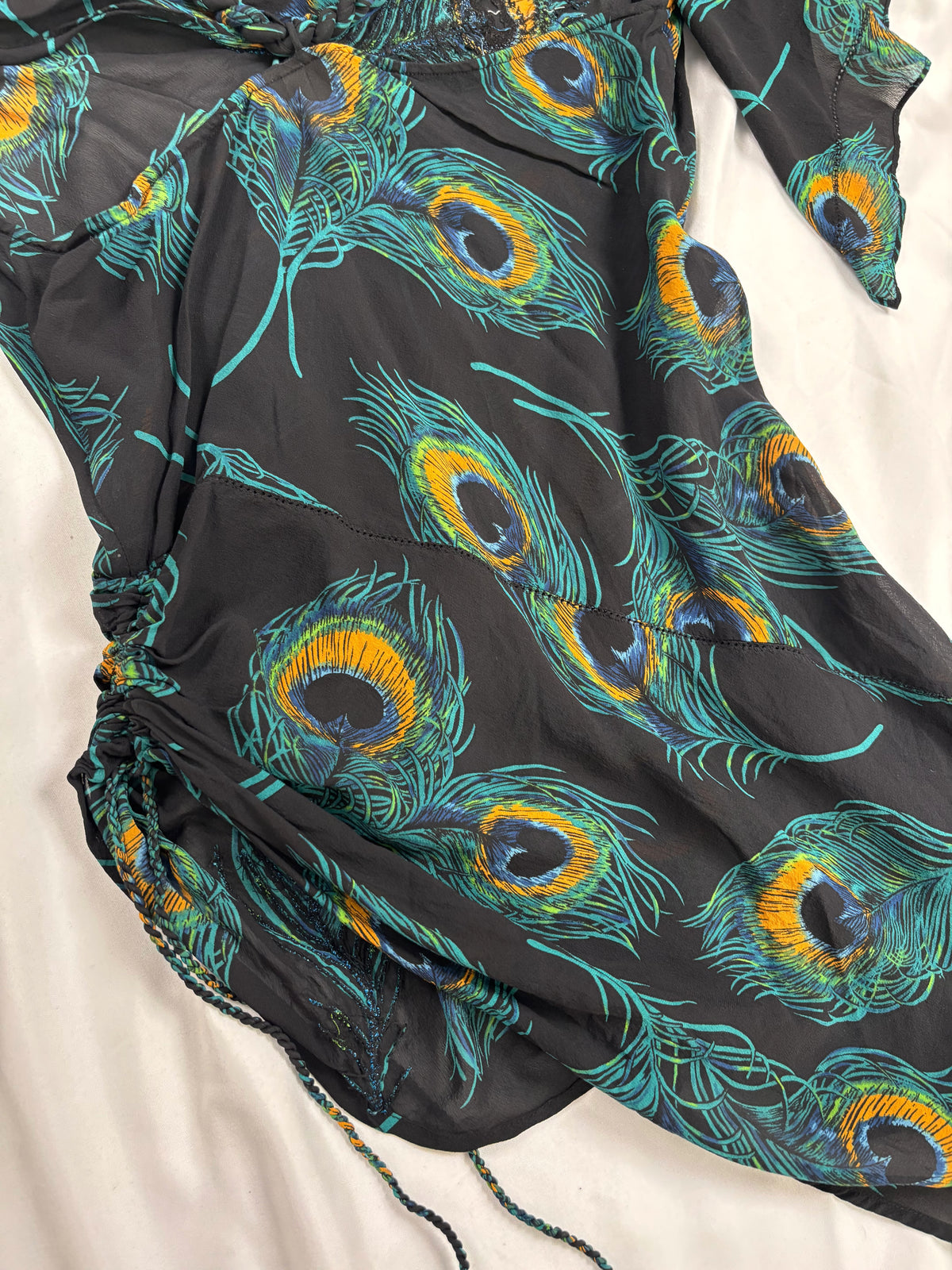 Black sheer silk peacock detailed cross back top with embellishments