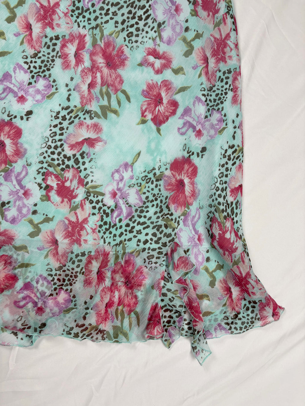 Light blue floral/ animal print skirt with ruffle detail