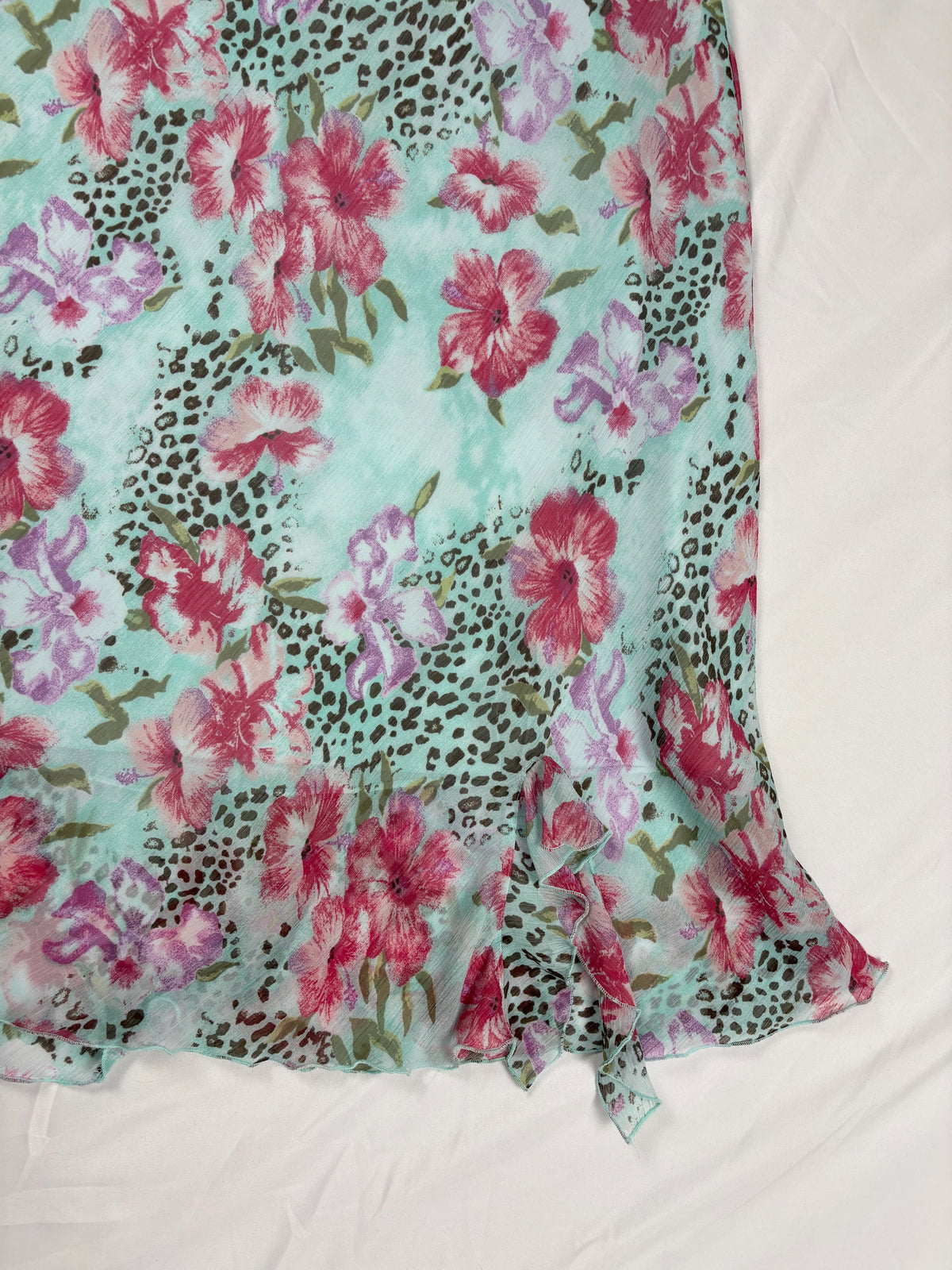 Light blue floral/ animal print skirt with ruffle detail