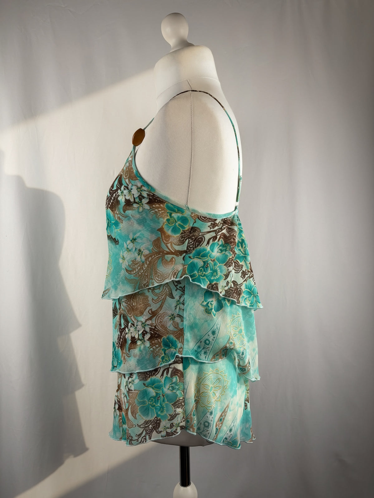 Blue and brown floral tiered ruffle cami with wooden bead details