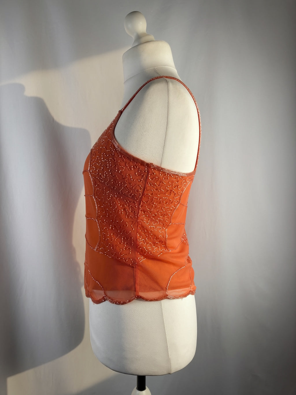 Orange asymmetric cut cami embellished with beads