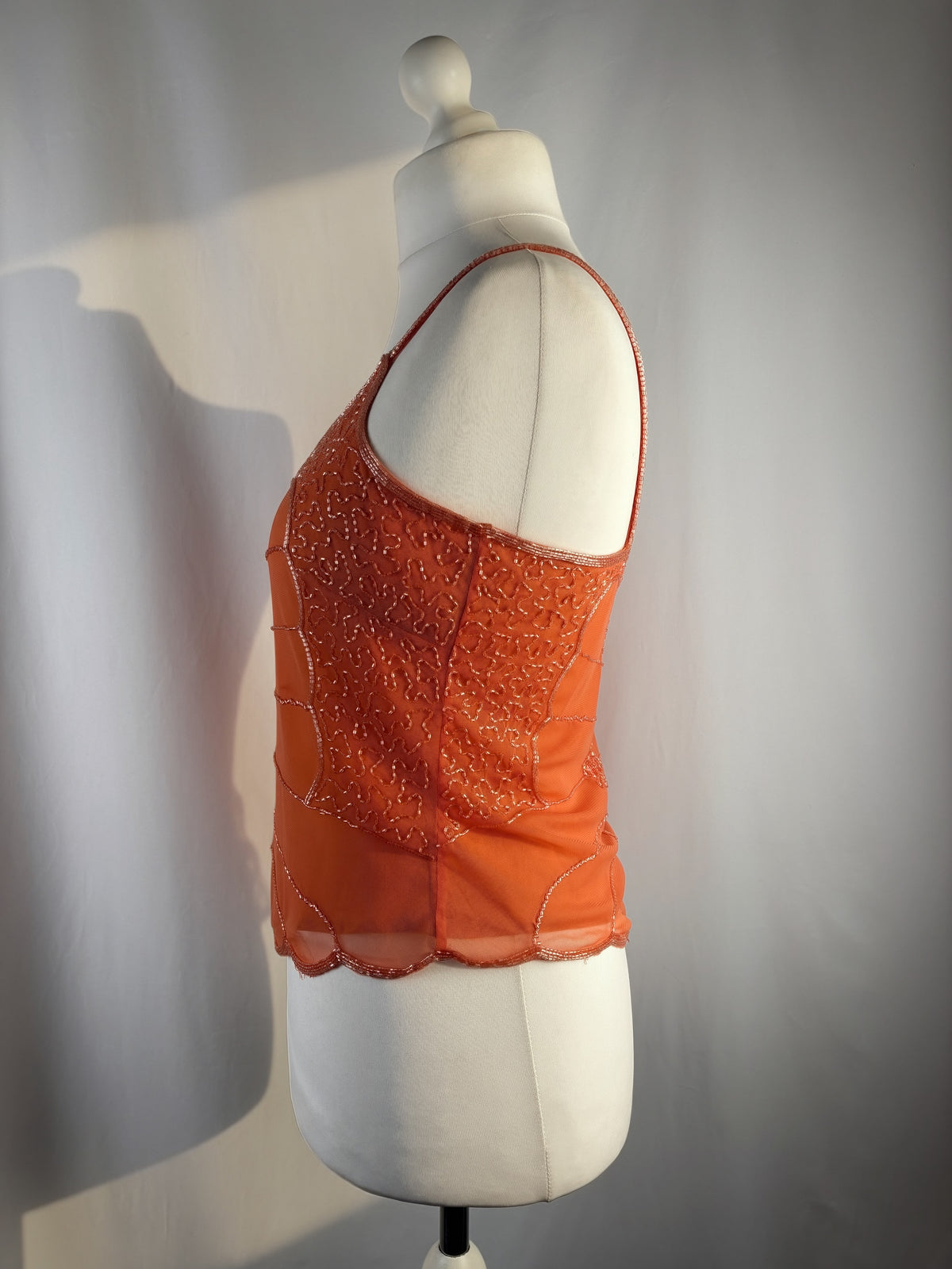 Orange asymmetric cut cami embellished with beads