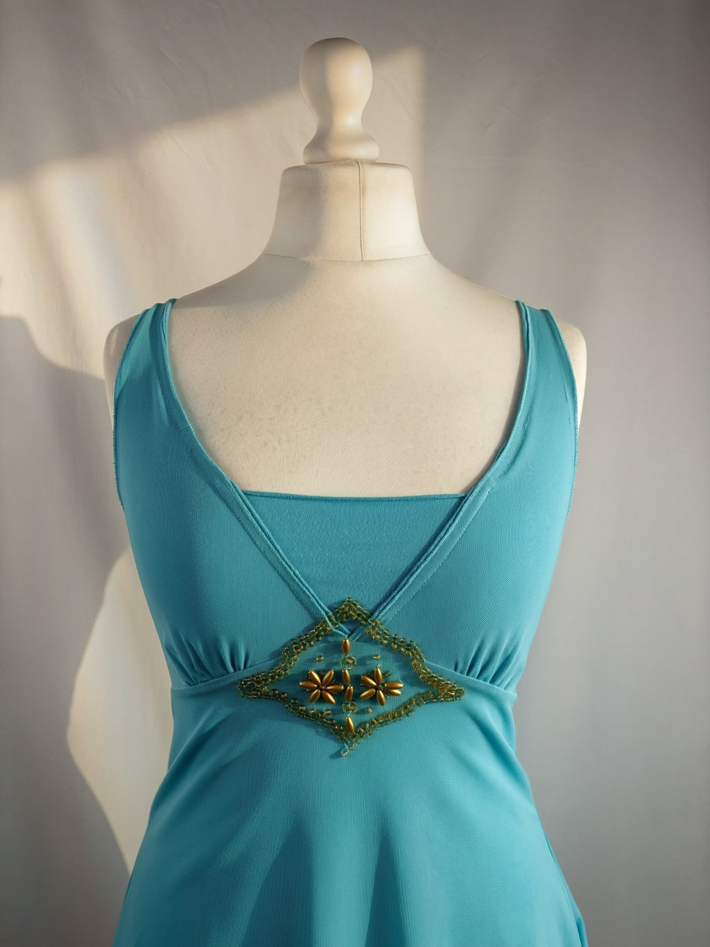 Blue flowy cami with gold bead details
