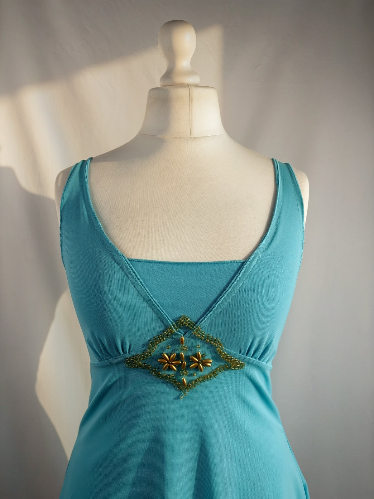Blue flowy cami with gold bead details